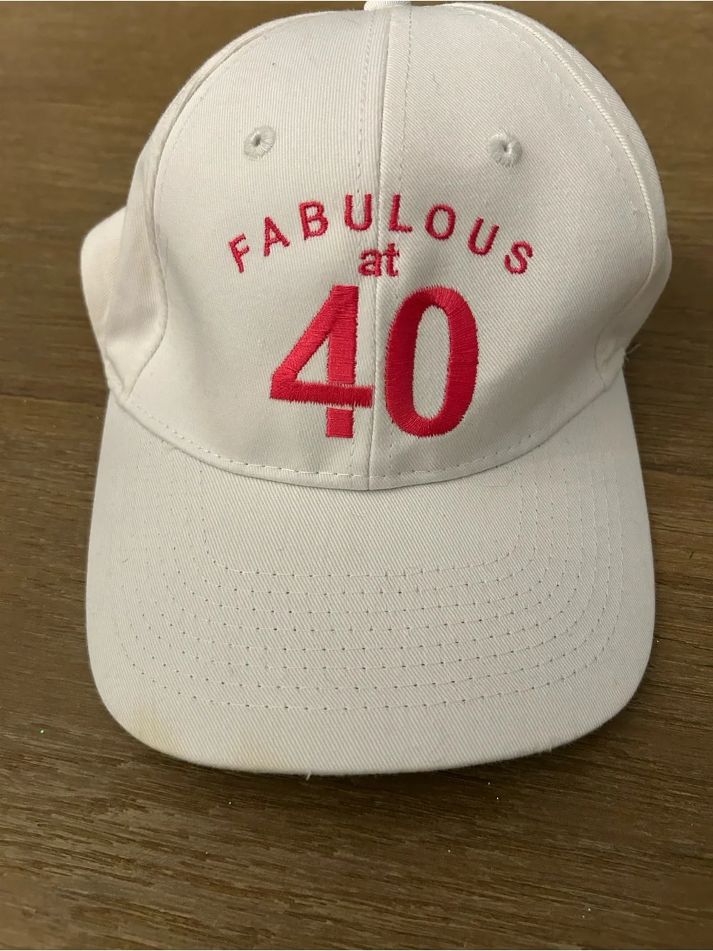 Pink and white baseball cap, 40th birthday